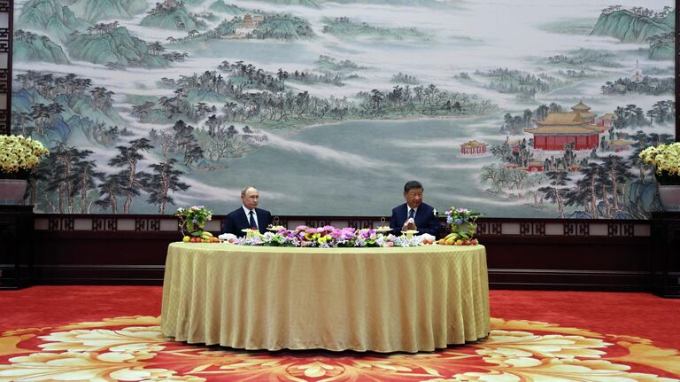 Путин одержал дипломатическую победу, пишет Bloomberg