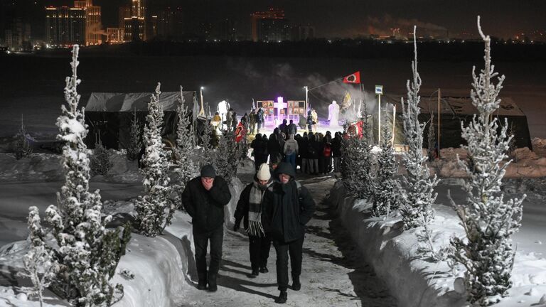 Путин окунулся в прорубь на Крещение